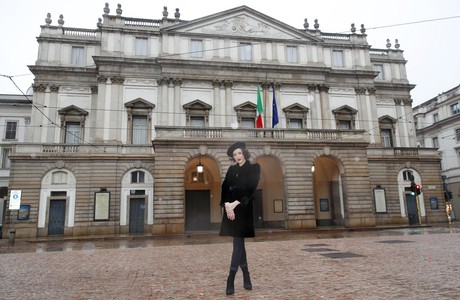 Lisette Oropesa poses in front of Teatro alla Scala in clothes by Giorgio Armani